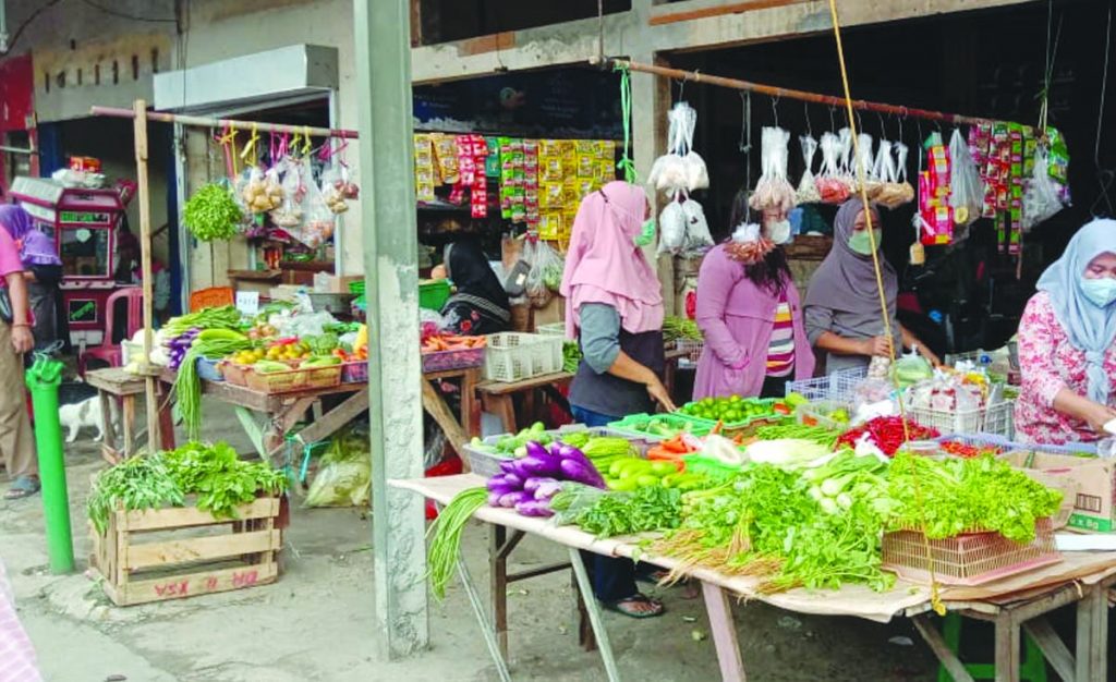 Pedagang di pasar tradisional. (dok Indopos)