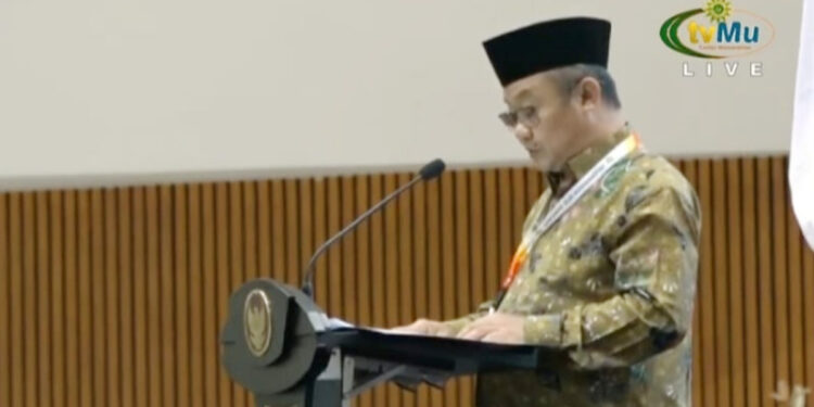Sekretaris Umum PP Muhammadiyah periode 2015-2020 Abdul Mu'ti membacakan keputusan induk haail muktamar ke-48 Muhammadiyah. Foto: YouTube tvMu